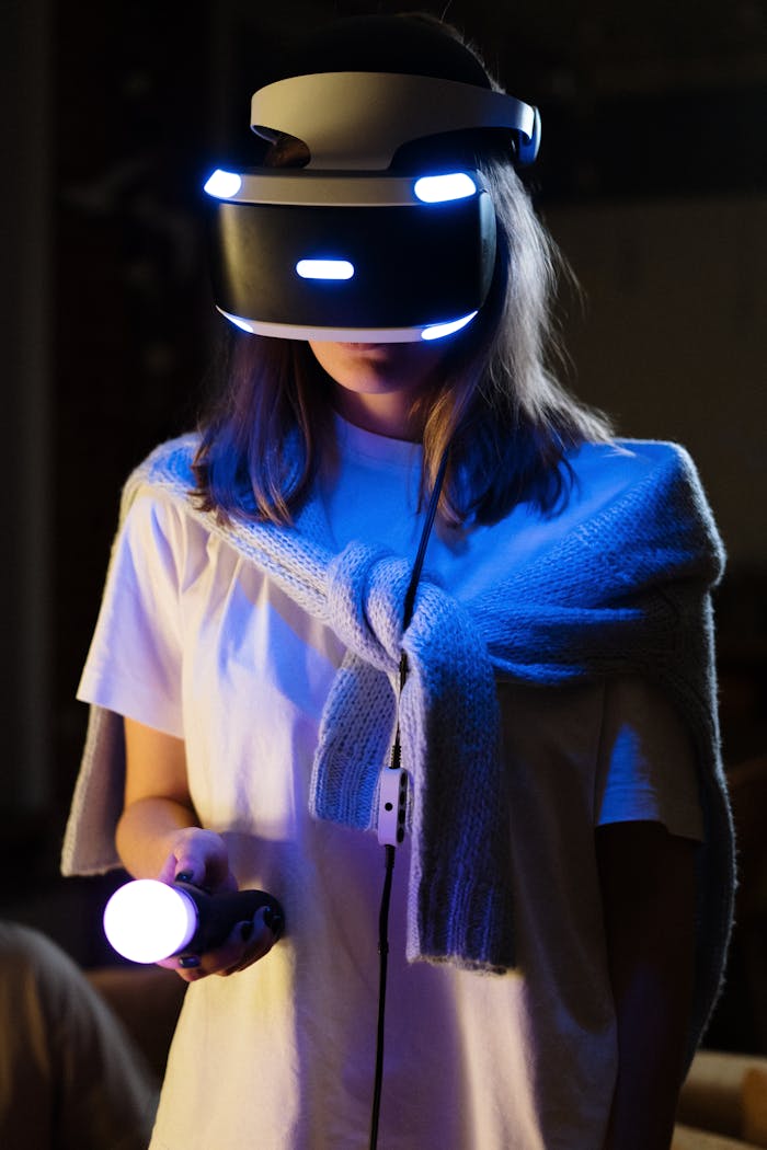 gallery-01 A young woman immersed in virtual reality gaming, wearing a VR headset and controller.